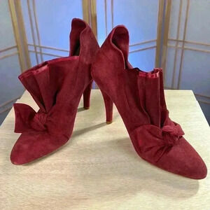 Te Casan Limited Edition red suede heels 
Size: 40 or 9.5 NEW